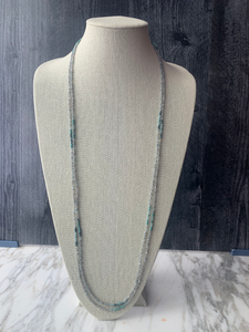 Long beaded necklace with aquamarine